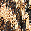 Poncho corto da donna oro-nero, 